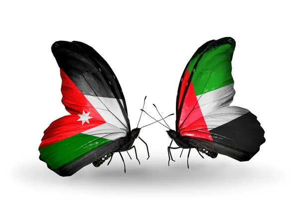 Dos mariposas con banderas de Jordania y Emiratos Árabes Unidos — Foto de Stock