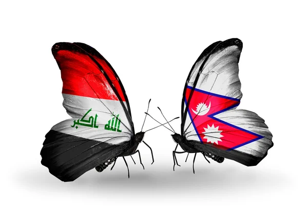 Two butterflies with flags of Iraq and Nepal — Stock Photo, Image