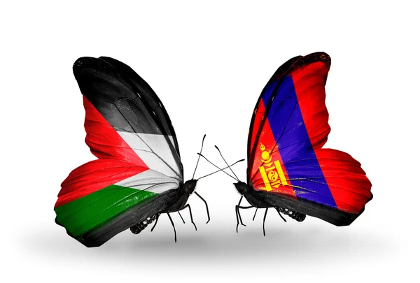 Две бабочки с флагами Палестины и Монголии — стоковое фото
