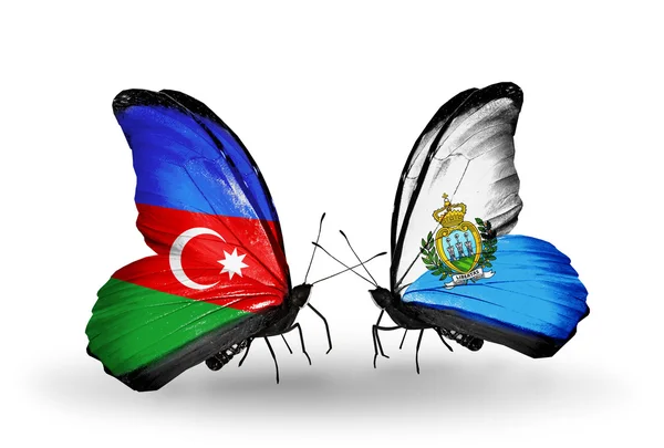 Dos mariposas con banderas de Azerbaiyán y San Marino — Foto de Stock