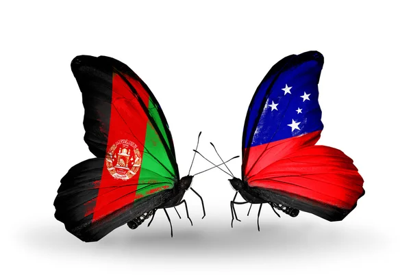Δύο πεταλούδες με σημαίες του Αφγανιστάν και της Σαμόα — Φωτογραφία Αρχείου
