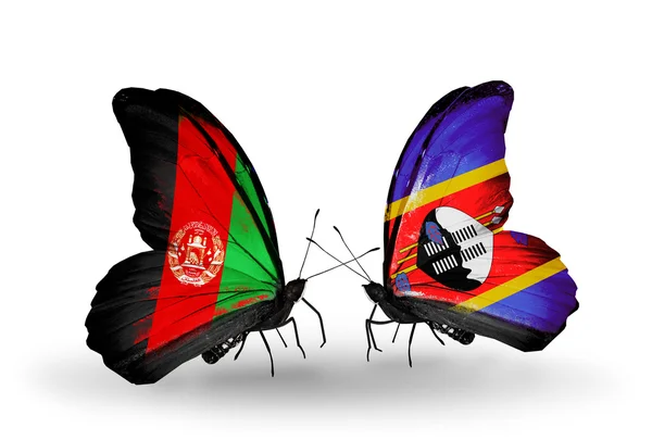 Две бабочки с флагами Афганистана и Свазиленда — стоковое фото