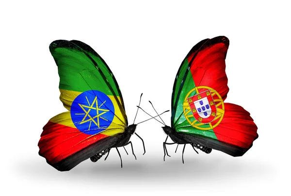 Two butterflies with flags of  Ethiopia and Portugal — Stock Photo, Image
