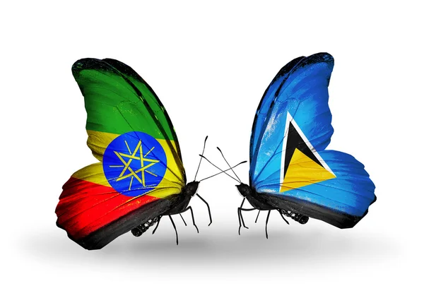 Two butterflies with flags of Ethiopia and Saint Lucia — Stock Photo, Image