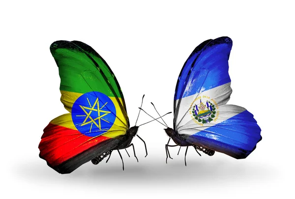 Deux papillons avec des drapeaux de l'Ethiopie et du Salvador — Photo