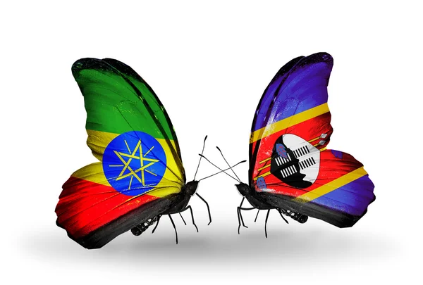 Two butterflies with flags of  Ethiopia and Swaziland — Stock Photo, Image