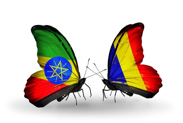 Two butterflies with flags of  Ethiopia and Chad, Romania — Stock Photo, Image