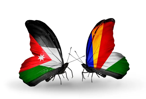 Two butterflies with flags of   Jordan and Seychelles — Stock Photo, Image