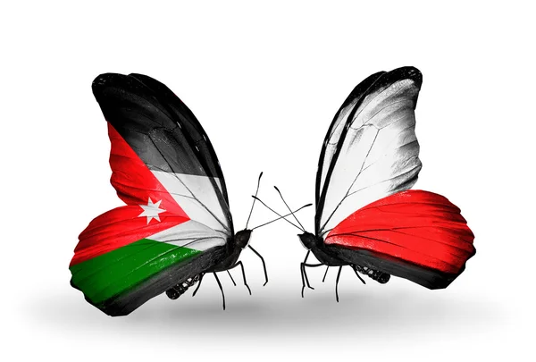 Dva motýli s příznaky Jordánska a Polsko — Stock fotografie