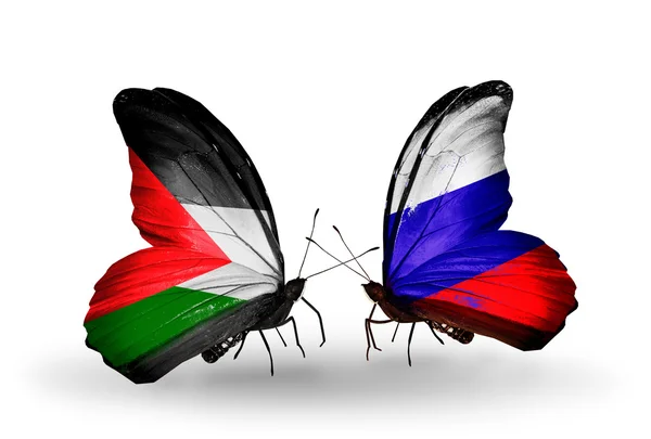 Due farfalle con bandiere di Palestina e Russia — Foto Stock