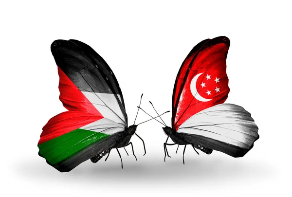 Two butterflies with flags of   Palestine and Singapore — Stock Photo, Image