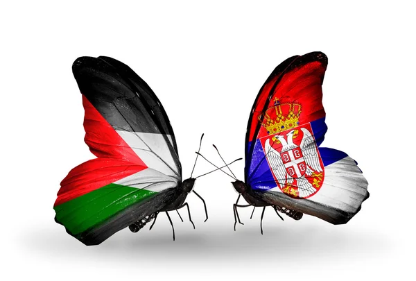 Two butterflies with flags of  Palestine and Serbia — Stock Photo, Image