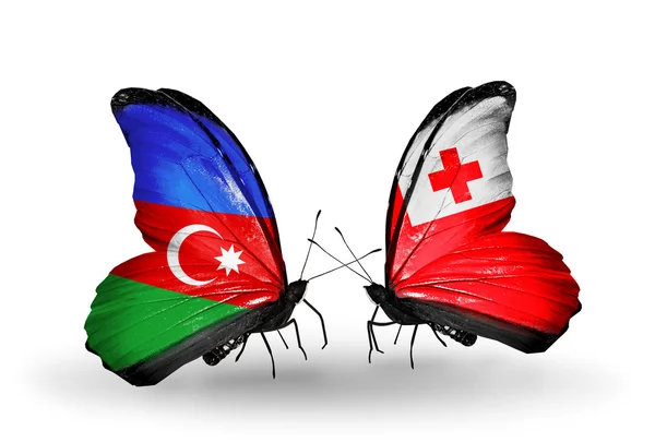 Dua kupu-kupu dengan bendera Azerbaijan dan Tonga — Stok Foto