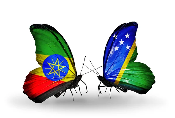 Due farfalle con bandiere di Etiopia e Isole Salomone — Foto Stock