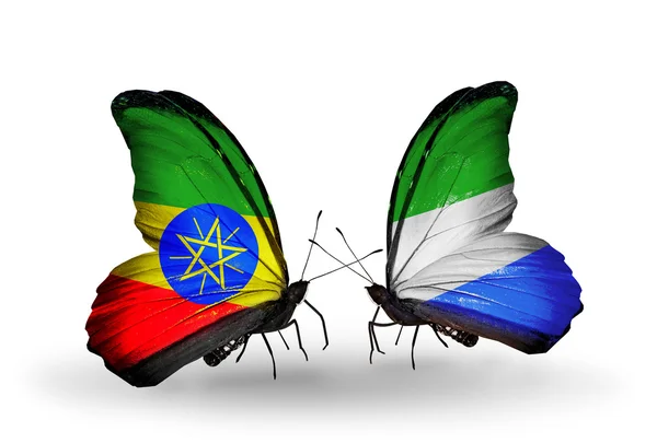 Dos mariposas con banderas de Etiopía y Sierra Leona — Foto de Stock