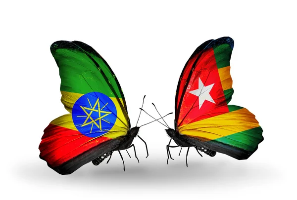エチオピア、トーゴの国旗と 2 匹の蝶 — ストック写真