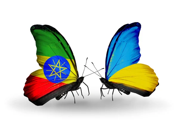 Deux papillons avec des drapeaux d'Éthiopie et d'Ukraine — Photo