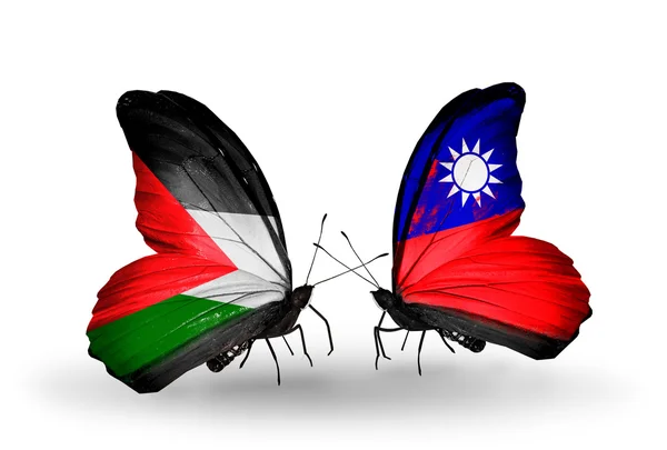 Dwa motyle z flagami Palestyny i Tajwanu — Zdjęcie stockowe