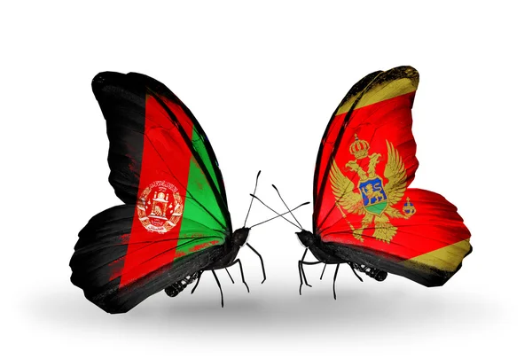 Två fjärilar med flaggor i afghanistan och montenegro — Stockfoto