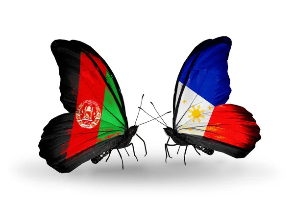 Dwa motyle z flagami w Afganistanie i Filipiny — Zdjęcie stockowe