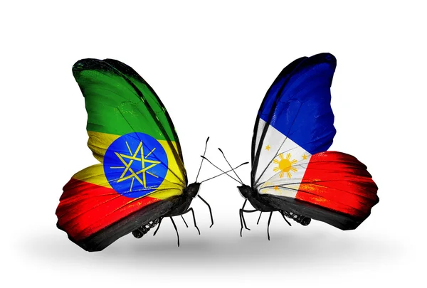 Duas borboletas com bandeiras da Etiópia e Filipinas — Fotografia de Stock