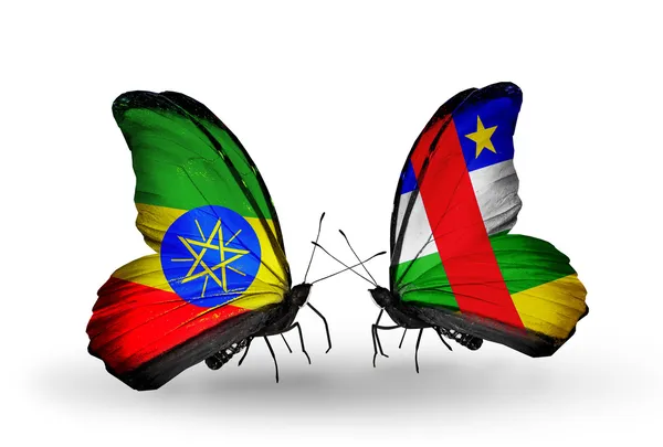 Две бабочки с флагами Эфиопии и ЦАР — стоковое фото