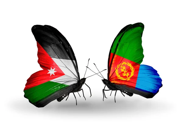 Dwa motyle z flagami jordan i Erytrei — Zdjęcie stockowe