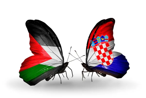 पॅलेस्टाईन आणि क्रोएशियाच्या ध्वजांसह दोन फुलपाखरू — स्टॉक फोटो, इमेज