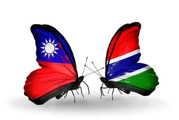 Papillons avec drapeaux Taïwan et Gambie sur les ailes — Photo
