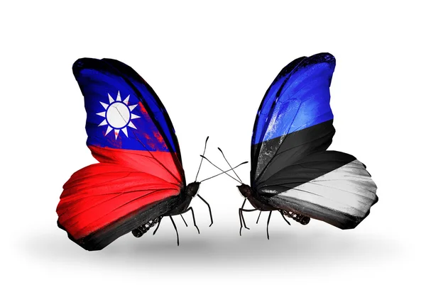 Butterflies with Taiwan and Estonia flags on wings — Stock Photo, Image