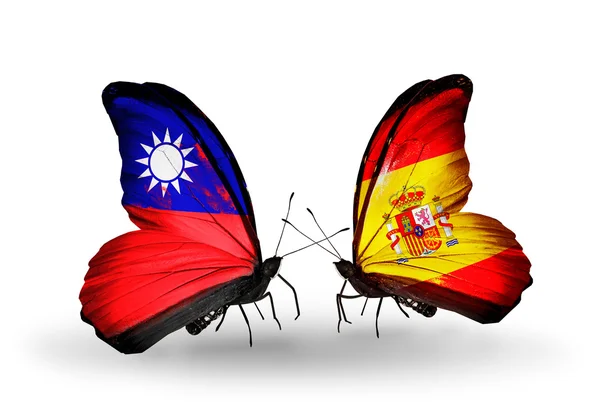 翼に台湾とスペインのフラグと蝶 — ストック写真
