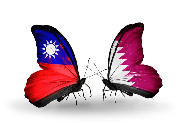 Butterflies with Taiwan and Qatar flags on wings — Stock Photo, Image