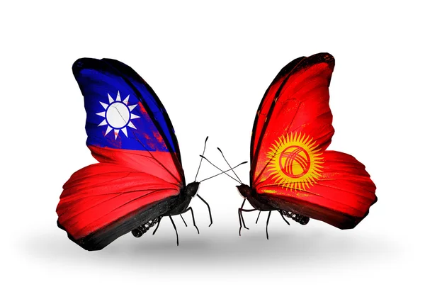 Borboletas com bandeiras de Taiwan e Quirguiz em asas — Fotografia de Stock
