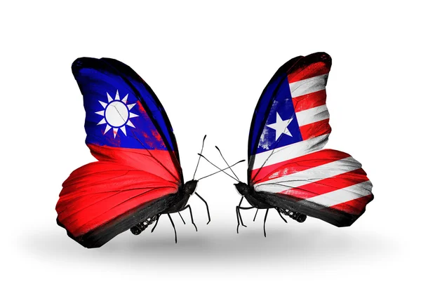 Бабочки с флагами Тайваня и Либерии на крыльях — стоковое фото