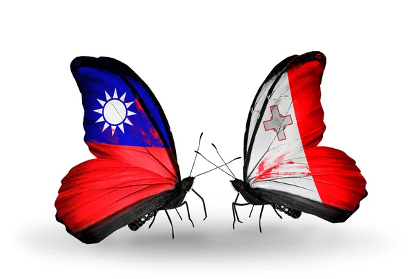 Бабочки с флагами Тайваня и Мальты на крыльях — стоковое фото