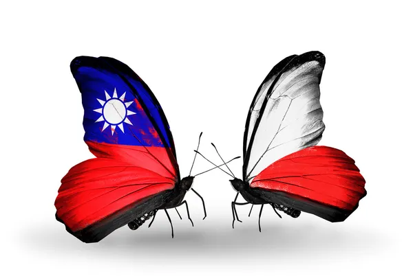 Бабочки с флагами Тайваня и Польши на крыльях — стоковое фото