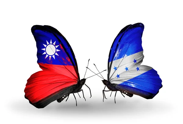 Butterflies with Taiwan and Honduras flags on wings — Stock Photo, Image