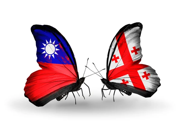 Butterflies with Taiwan and Georgia flags on wings — Stock Photo, Image