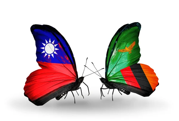 Schmetterlinge mit Taiwan- und Sambia-Flaggen auf Flügeln — Stockfoto