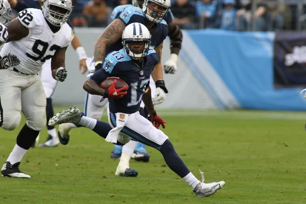 stock image Kendall Wright of the Tennessee Titans catches a pass from QB Marcus Mariota in a game against the Oakland Raiders on November 29, 2015, in Nashville, TN.