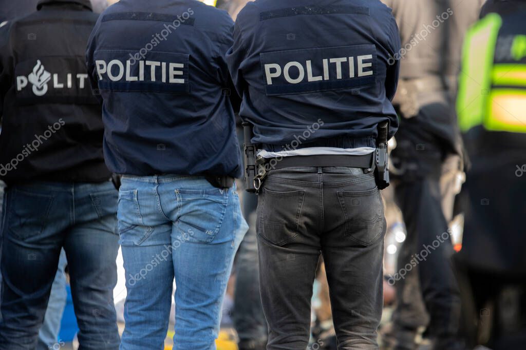 Backside Police Man Guarding The Demonstrators The Rebellion Extinction Demonstration At Amsterdam South The Netherlands 21-9-2020
