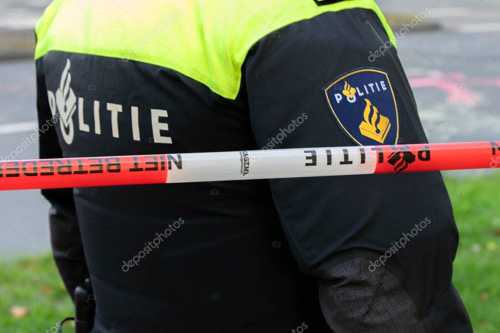 Police Man Behind Ducktape At Amsterdam The Netherlands 21-9-2020