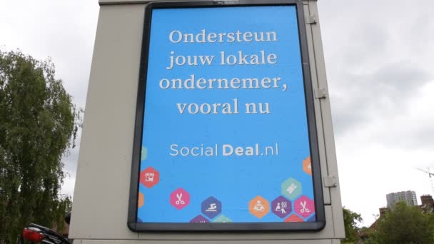 Billboard Apoya Tus Negocios Locales Amsterdam Netherlands 2020 — Vídeos de Stock