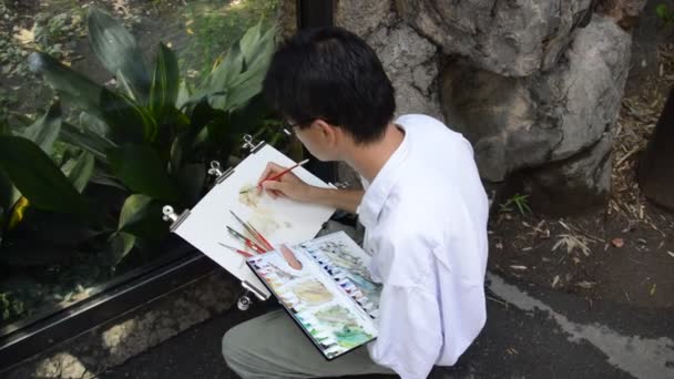 上野動物園で絵を描く男 東京ジャパン2016 — ストック動画