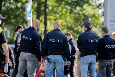 Amsterdam 'daki İsyan sırasında 21-9-2020 Polis Teşkilatı Soykırım Gösterisi