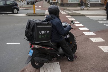 Amsterdam 'da Uber Scooter Teslimatı Hollanda 20-1-2021