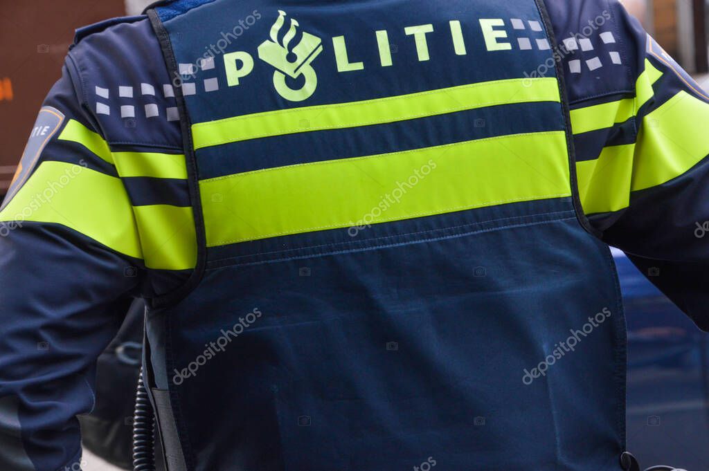 Dutch Policeman From The Back At Amsterdam The Netherlands 2018
