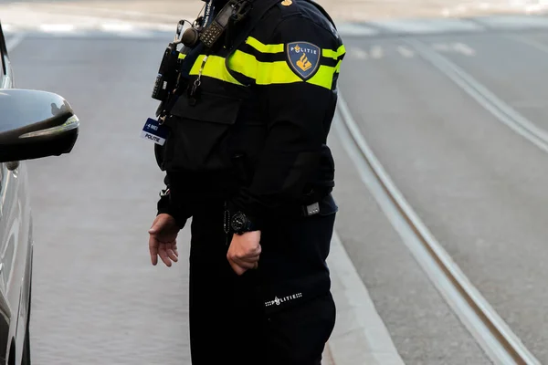 Side View Police Man Amsterdamie Holandia 2020 — Zdjęcie stockowe