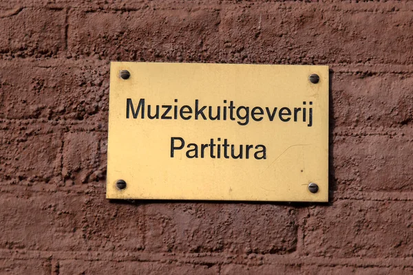 Amsterdam 'daki Duvar İşareti Muziekuitgeverij Partitura Hollanda 10-2-2022