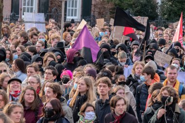 Crowds Protesting At The Niet Mijn Schuld Demonstration At Amsterdam The Netherlands 5-2-2022